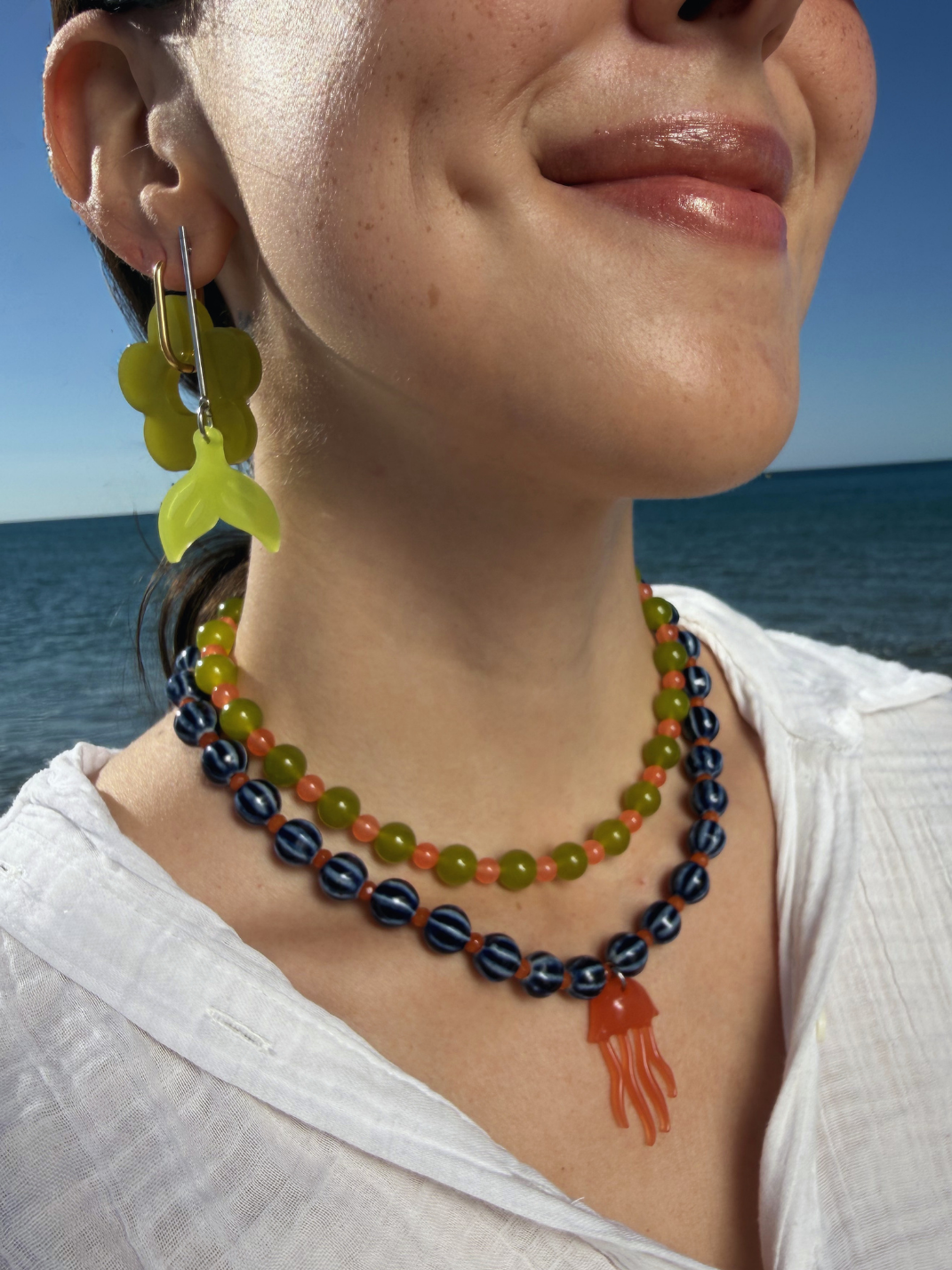 Collar sol, mar y arena